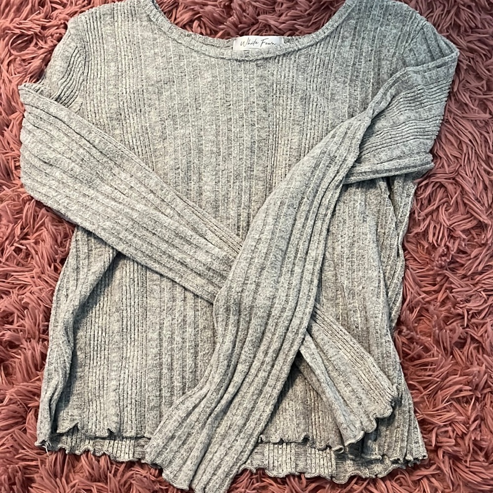 Grey long sleeve top. Size medium but runs small.